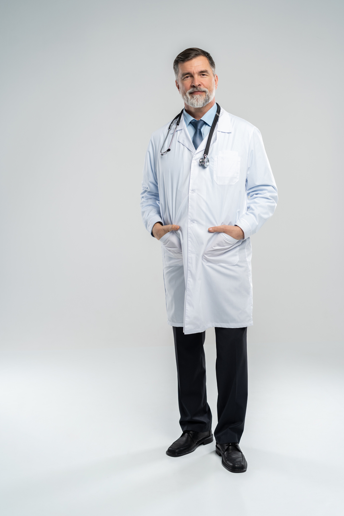 Full Body Portrait of Happy Smiling Doctor